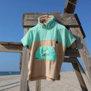 Wave havaii Poncho Kids Dropsi on the beach