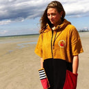 wave hawaii poncho dusty woman